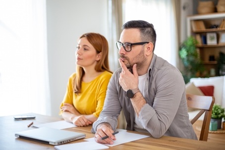 serious couple at lawyer's office